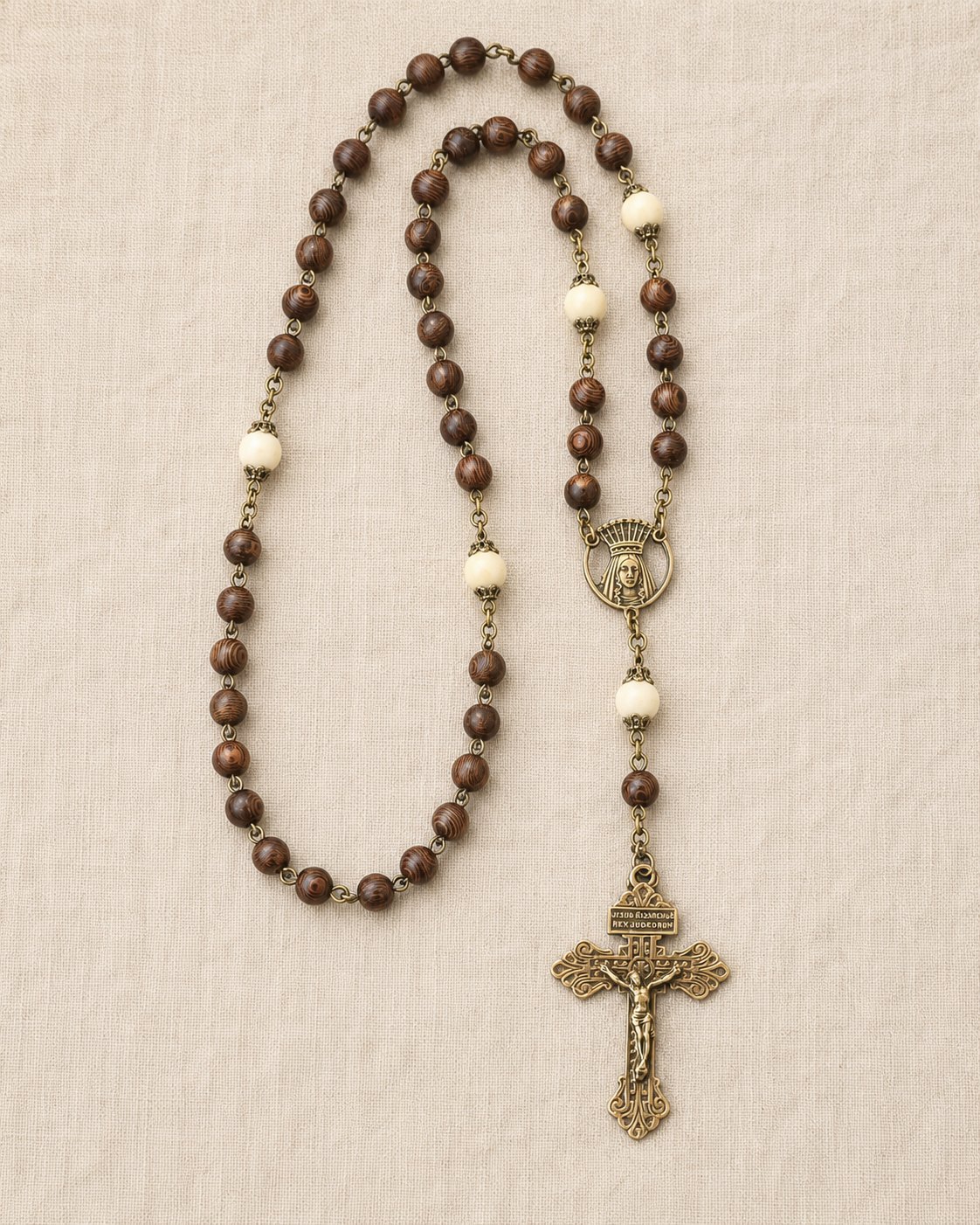 Brown woodgrain-style Marian rosary with creamy accent beads